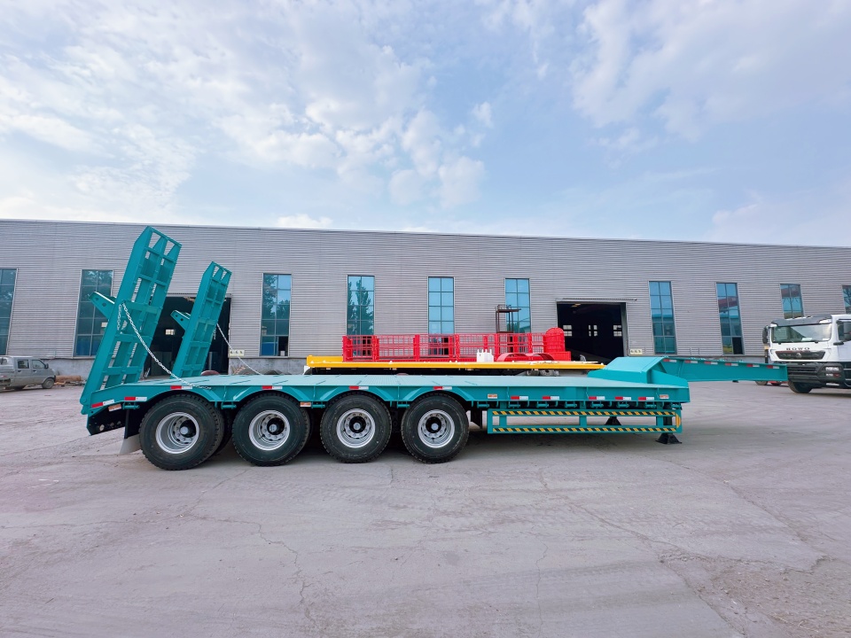 Semi-trailer met een lage bed met 4-as met succes verzonden naar Tanzania